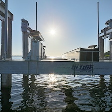 Premium-Aluminum-Dock-with-Concrete-Piles-Vinyl-Decking-and-120000-lb-Hi-Tide-Boat-Lift-Installation-in-Stuart-FL 3