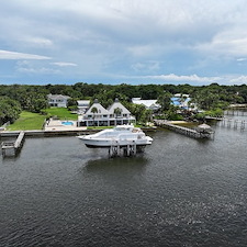 Premium-Aluminum-Dock-with-Concrete-Piles-Vinyl-Decking-and-120000-lb-Hi-Tide-Boat-Lift-Installation-in-Stuart-FL 2